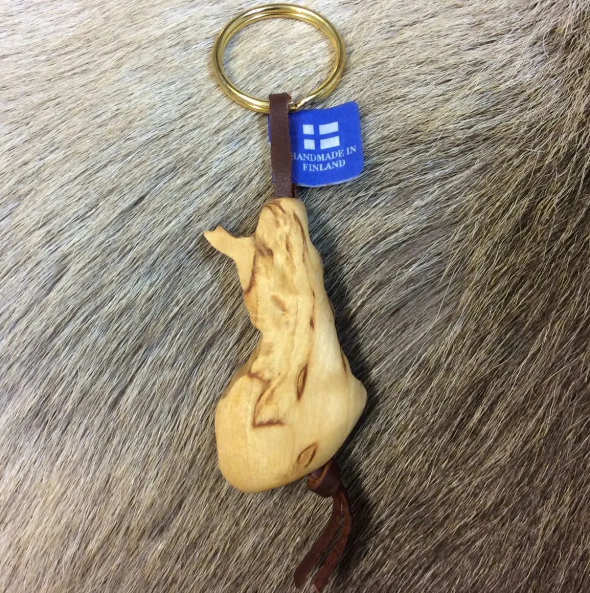 AVAIMENPERÄ VISAKOIVUISELLA FIGUURILLLA