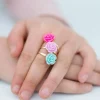 GREAT PRETENDERS BOUTIQUE ROSE RINGS & EARRING SET, 3 RINGS